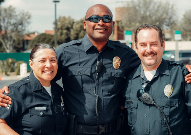 three police officers standing together